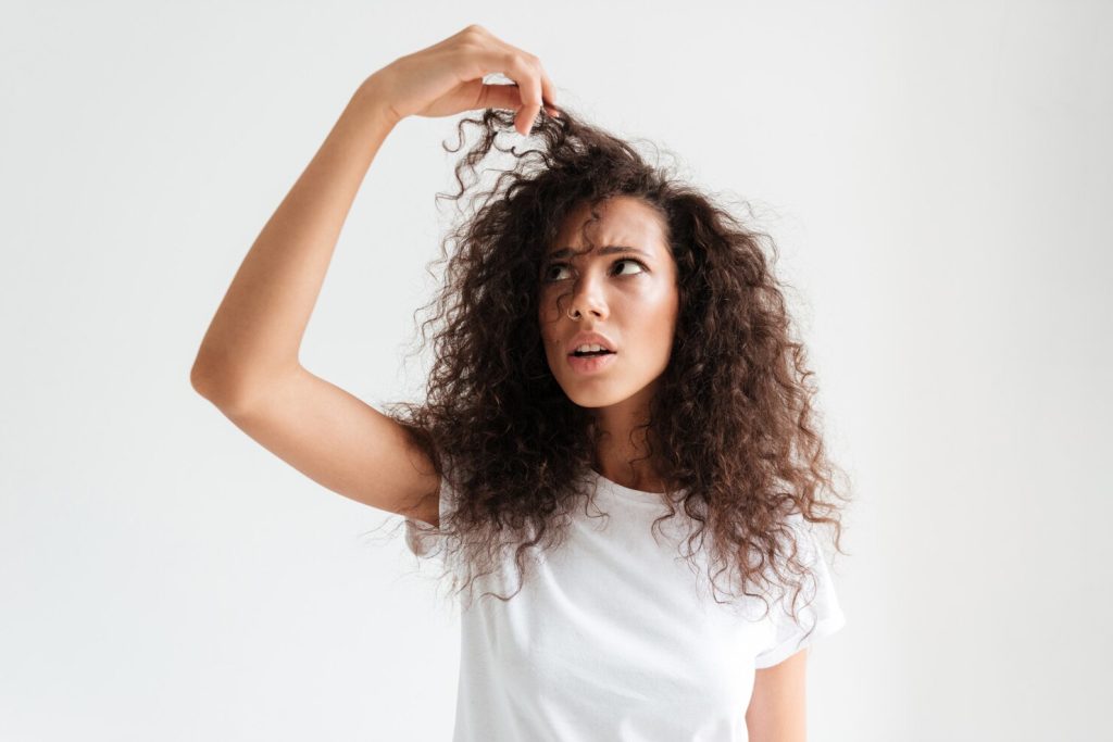 Patient receiving PRP injection for hair restoration treatment