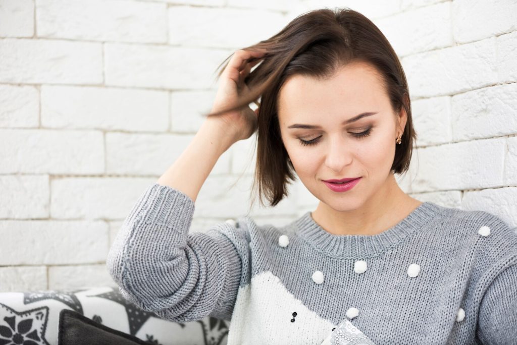 Man experiencing stress-related telogen effluvium hair shedding